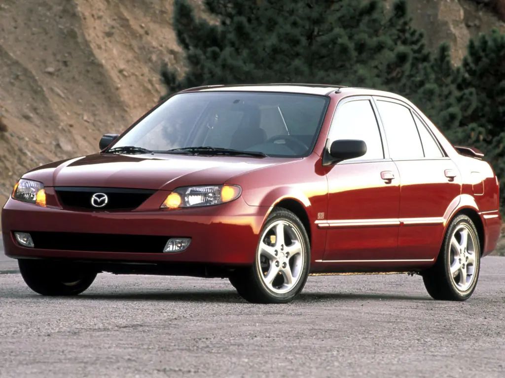 Mazda Protege (BJ) 3 поколение, рестайлинг, седан (03.2000 - 09.2003)